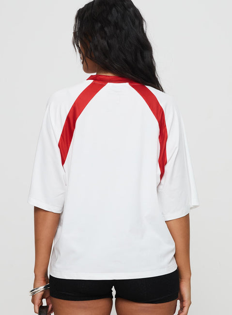 back view of model wearing Princess Polly One Star Top White / Red Half Sleeves V-Neck 