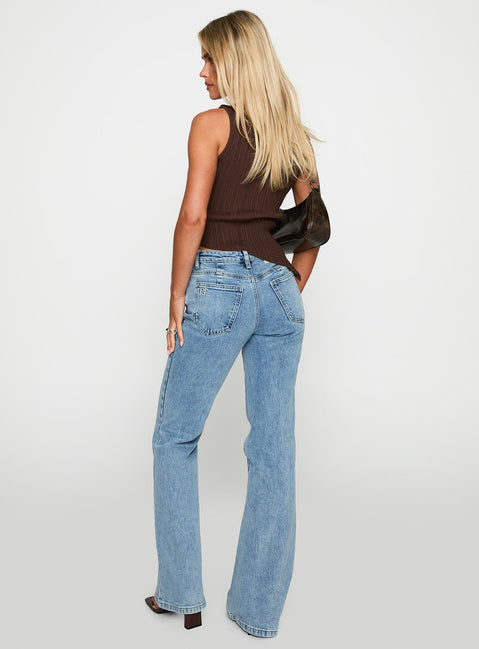 back view of model wearing Princess Polly Magic Mirror Mid Rise Bootleg Jeans Ice Wash Mid Rise 