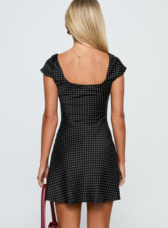 back view of model wearing Princess Polly Lucienna Polka Dot Mini Dress Black / White Square Neck 