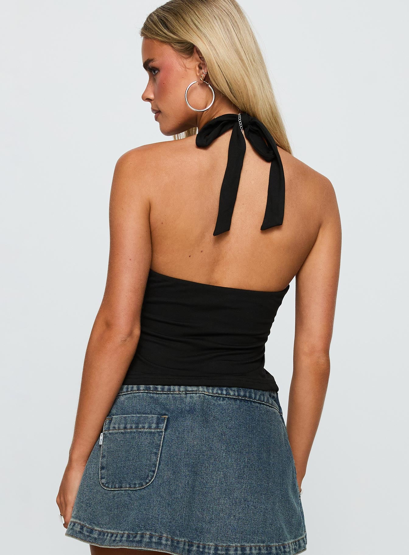 back view of model wearing Princess Polly No Hard Feelings Twist Top Black Sleeveless Plunger 