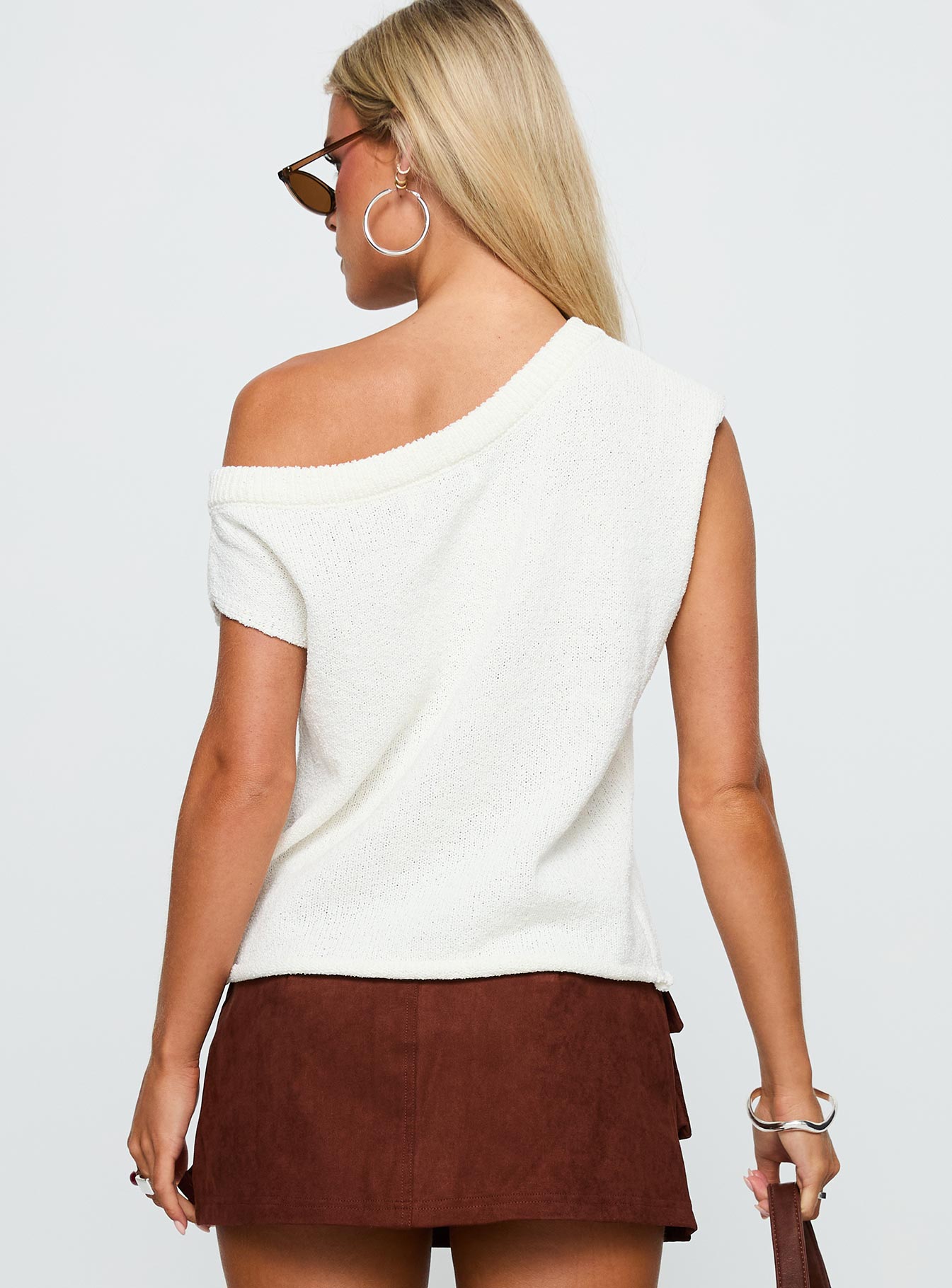 back view of model wearing Princess Polly Ashfield Off Shoulder Top White Short Sleeves Asymmetric Neckline 