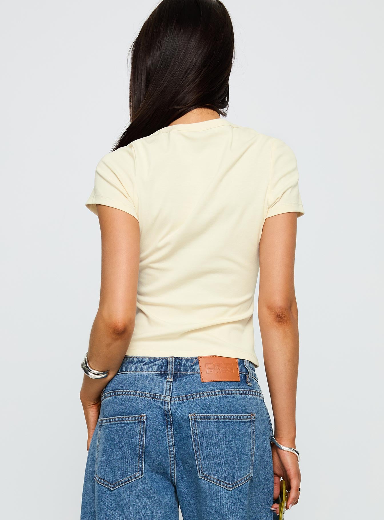 back view of model wearing Princess Polly Grapejuice Graphic Top Cream Short Sleeves Crew Neck 