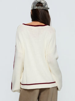 back view of model wearing Princess Polly Star Track Graphic Jumper Cream / Red Longline Jumpers 