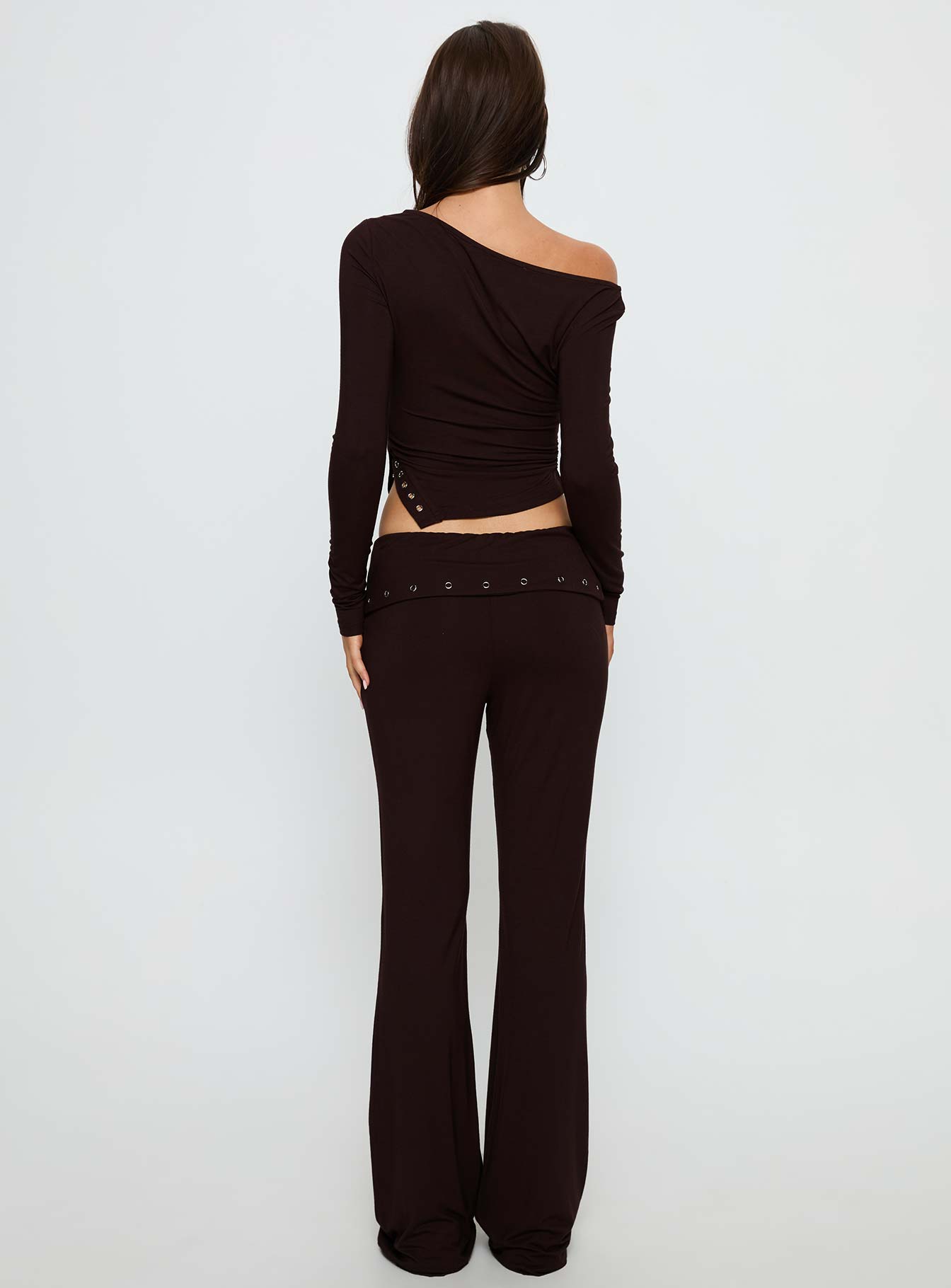 back view of model wearing Princess Polly Wynna Eyelet Foldover Pants Chocolate Low Rise Pants 