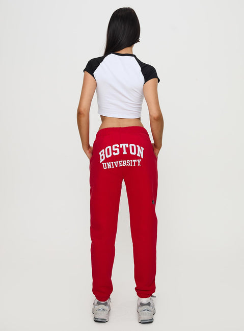 back view of model wearing Princess Polly BU Sweatpants Red High Waisted Pants 