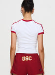 back view of model wearing Princess Polly USC Goalie Baby Tee White Short Sleeves Crew Neck 