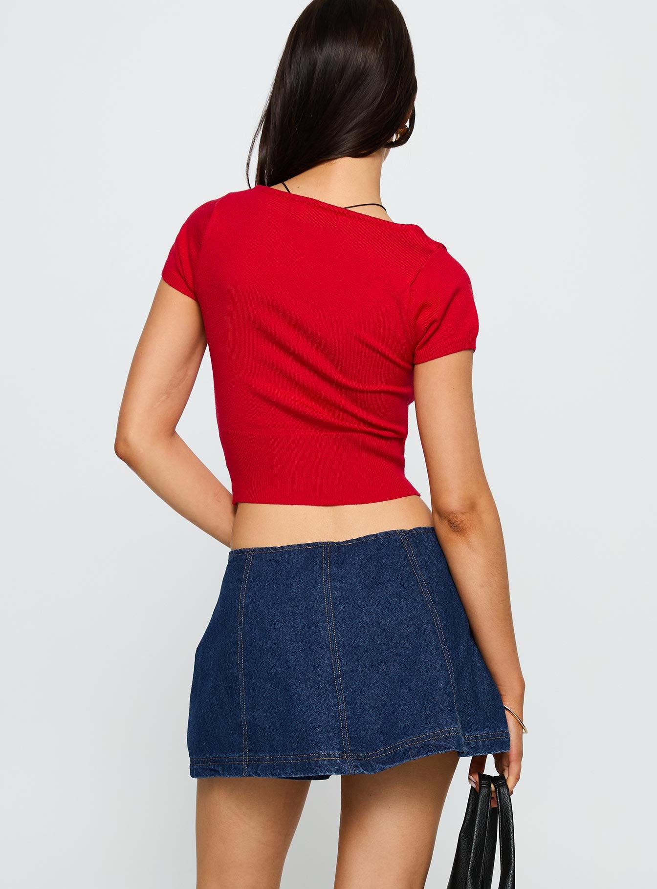 back view of model wearing Princess Polly Lemoni Skort Denim Blue Low Rise Shorts 