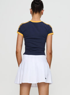 back view of model wearing Princess Polly UCSD Tennis Skort White 