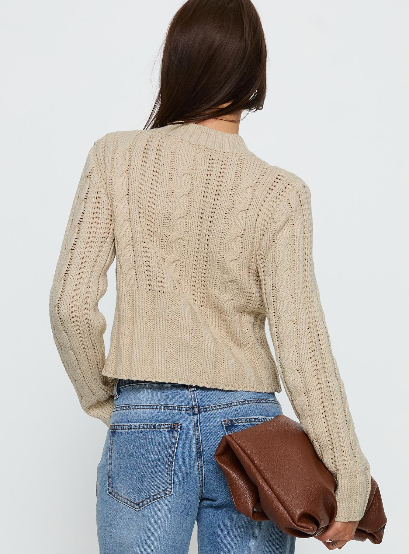 back view of model wearing Princess Polly Donielle Cable Knit Cardigan Beige cropped 