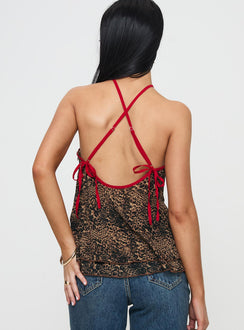 back view of model wearing Princess Polly Rafaella Halter Top Leopard Sleeveless Asymmetric Neckline 