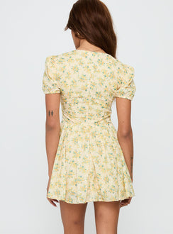 back view of model wearing Princess Polly Ethelyn Mini Dress Yellow Floral V-Neck 