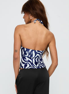 back view of model wearing Princess Polly Averee Halter Top Zebra Sleeveless Plunger 