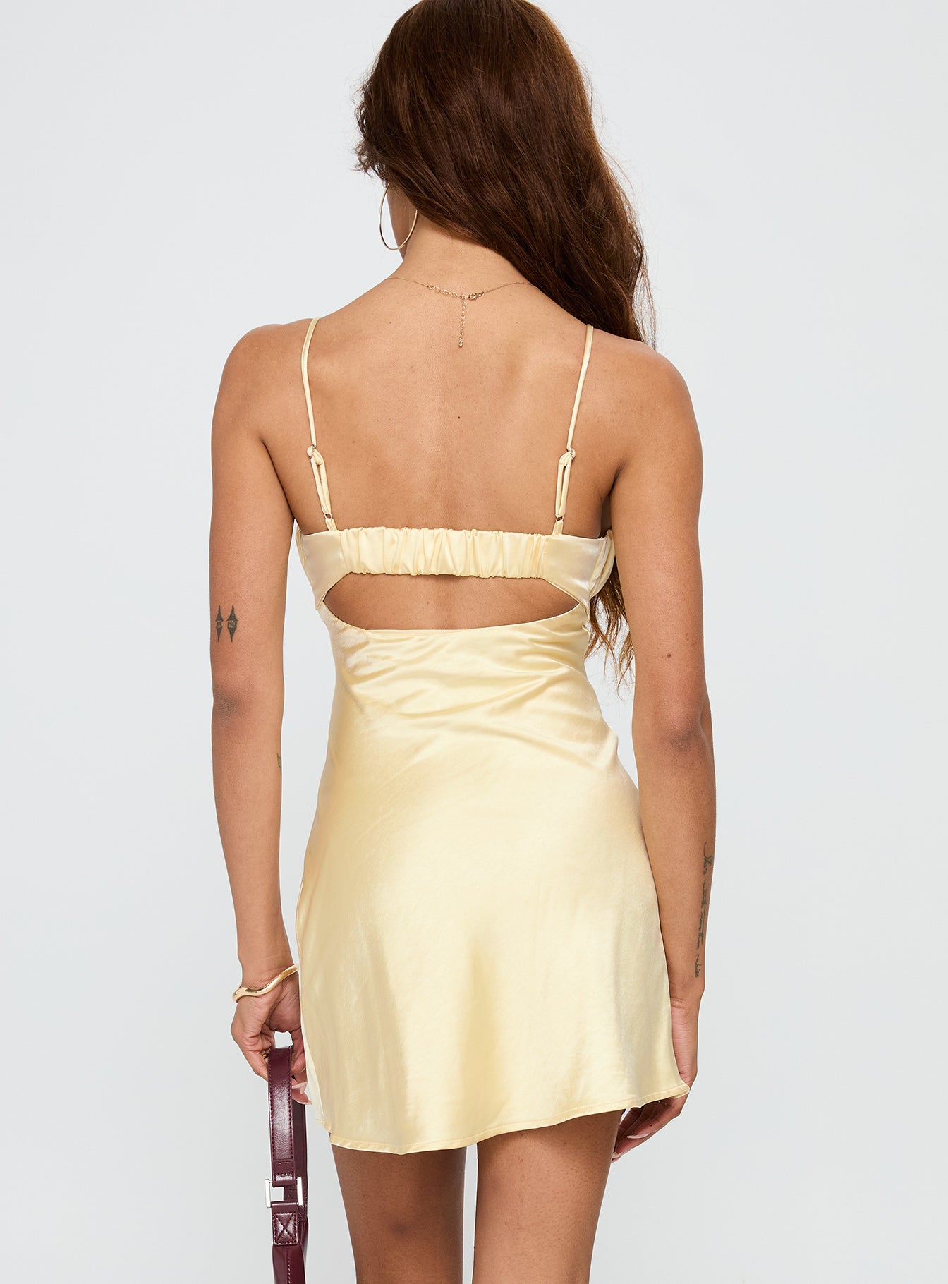 back view of model wearing Princess Polly Lulubelle Mini Dress Lemon Sweetheart Neckline 