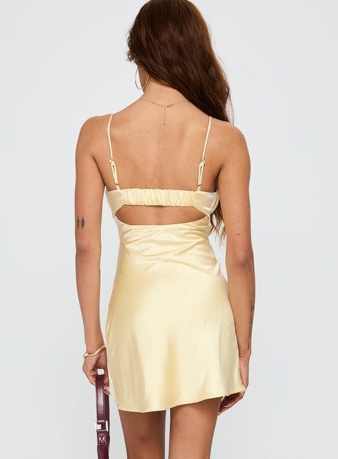 back view of model wearing Princess Polly Lulubelle Mini Dress Lemon Sweetheart Neckline 