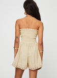 Strapless playsuit  Lace details, ruffle neckline, adjustable tie at neckline, shirred back, twin hip pockets 