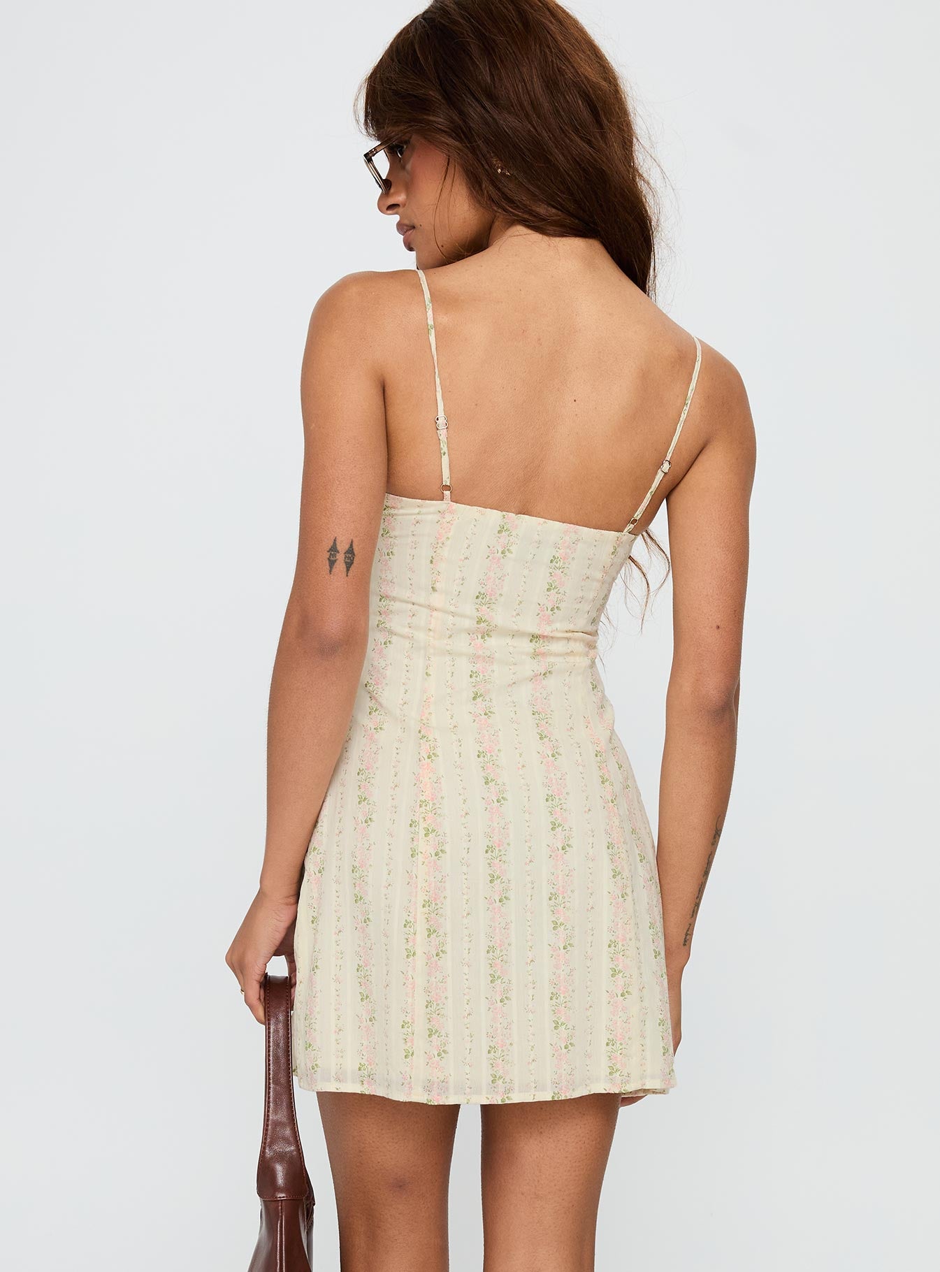 back view of model wearing Princess Polly Peppie Mini Dress Multi Floral Sweetheart Neckline 