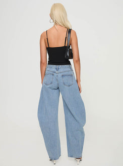 back view of model wearing Princess Polly Horseshoe Jeans Washed Blue High Waisted 