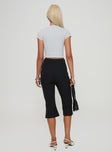 Pants High rise fit, capri length, slight flare in leg, invisible zip fastening Slight stretch, unlined 