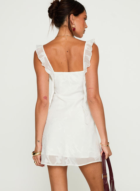 back view of model wearing Princess Polly Lanai Mini Dress White Floral Square Neck 
