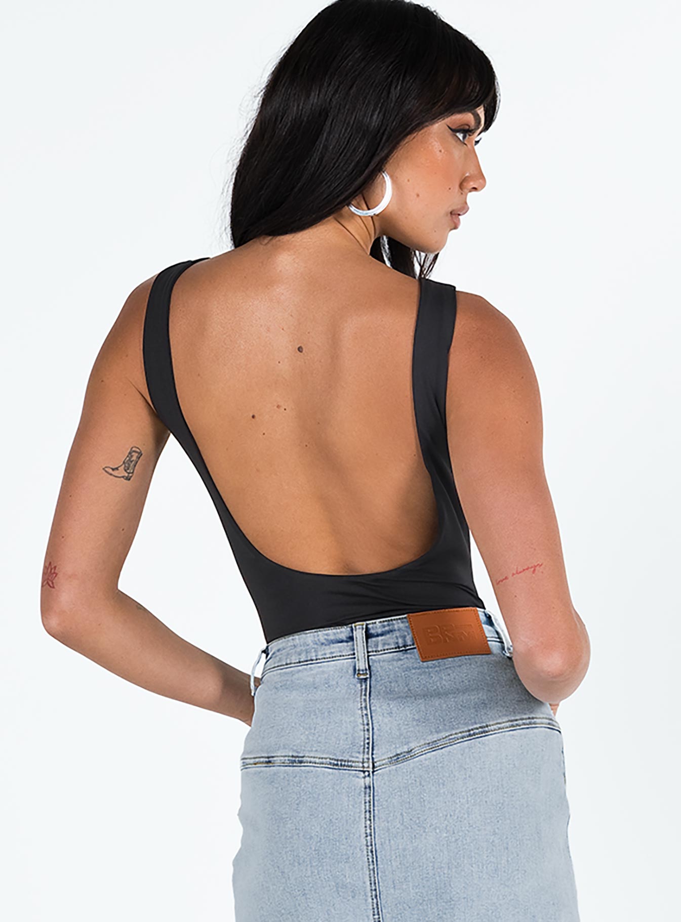 back view of model wearing Princess Polly Beresford Bodysuit Black Sleeveless Scoop Neck 