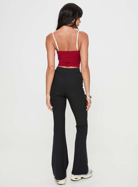 back view of model wearing Princess Polly Vasquez Flared Pants Black High Waisted Pants 