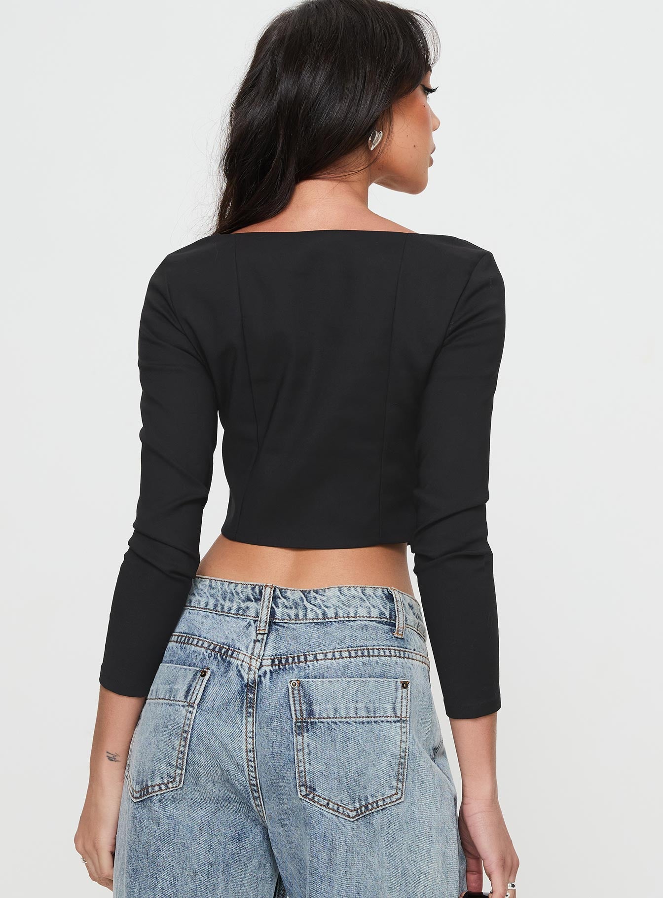 back view of model wearing Princess Polly Time Is Up Long Sleeve Top Black Full Sleeves V-Neck 