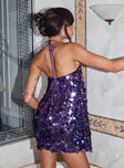 back view of model wearing Princess Polly Fluorescents Halter Mini Dress Purple Asymmetric Neckline 