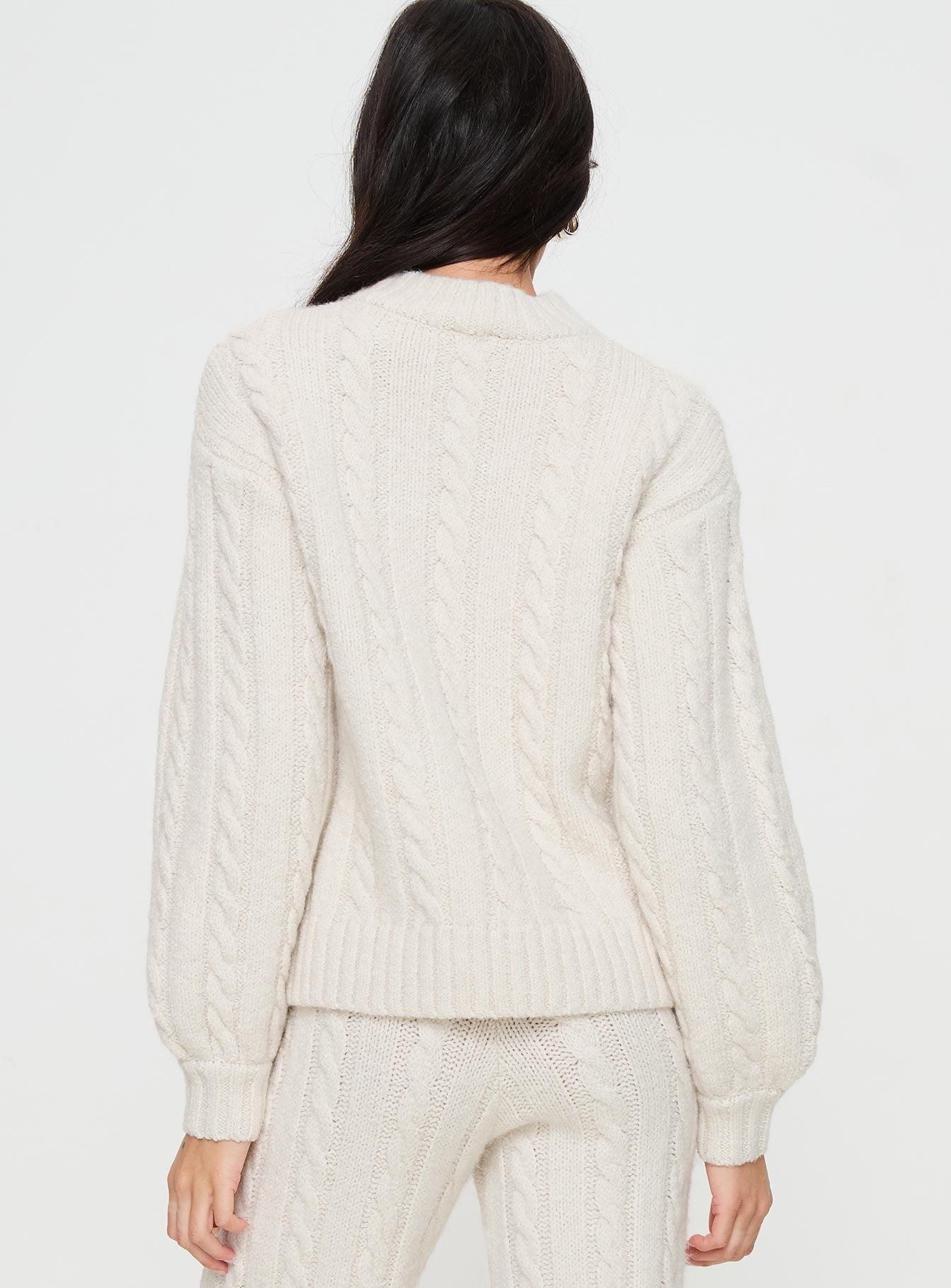 back view of model wearing Princess Polly Sharif Cable Knit Sweater Beige regular 