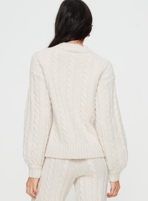 back view of model wearing Princess Polly Sharif Cable Knit Sweater Beige regular 