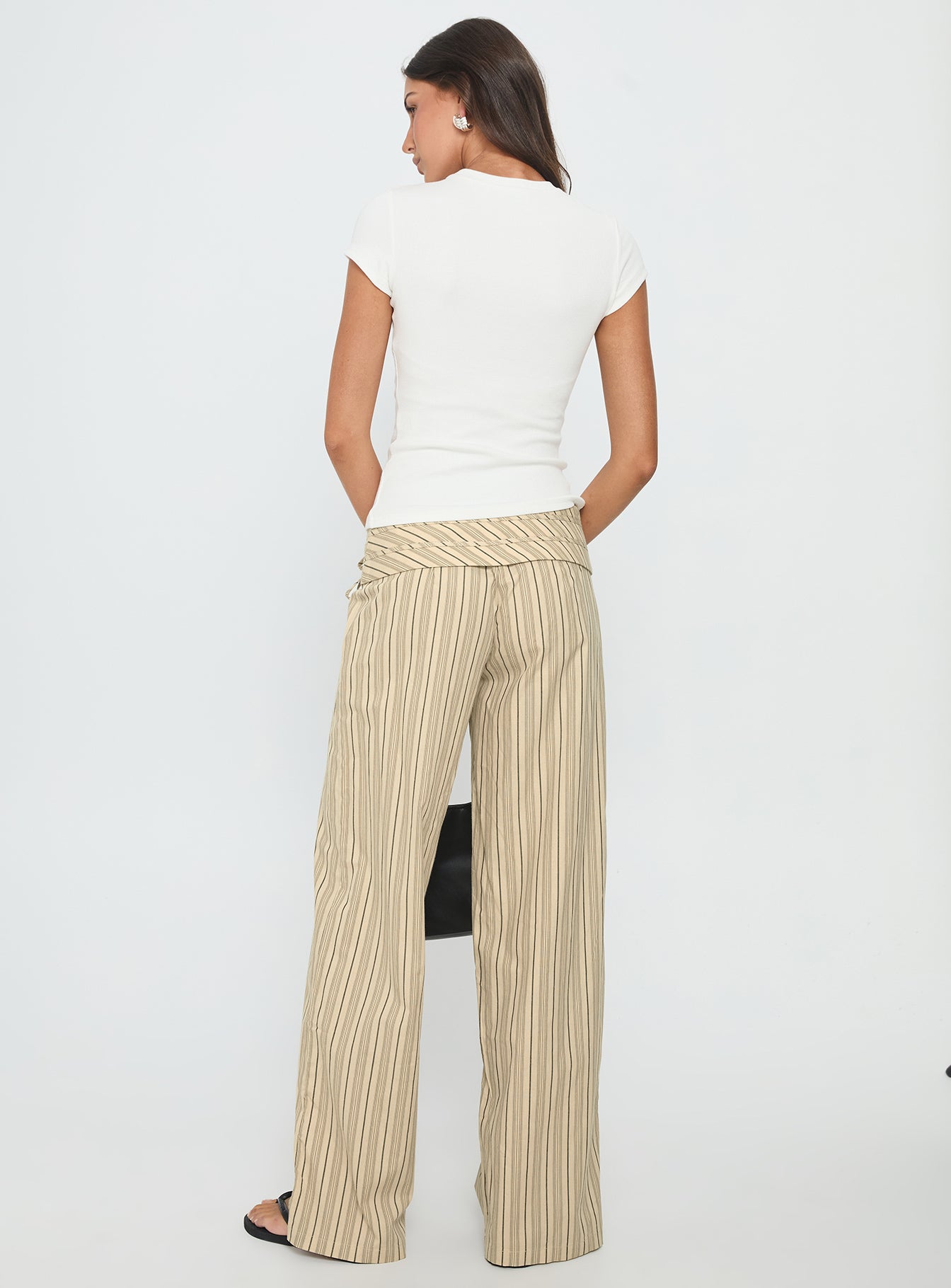 back view of model wearing Princess Polly Seneca Wrap Pant Beige Stripe Mid Rise Pants 