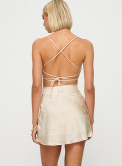 back view of model wearing Princess Polly Celena Mini Dress Champagne Cowl Neck 