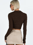 Brown long sleeve top Popcorn puff material  Classic collar  V neckline  Button front fastening 