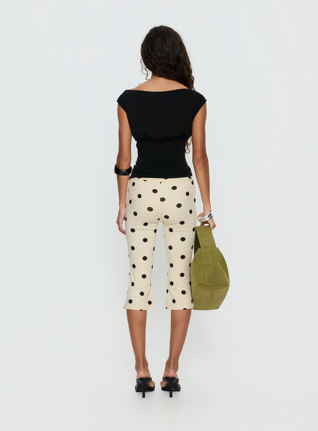 back view of model wearing Princess Polly Samaira Capri Pant Cream Polka Dot Mid Rise Pants 