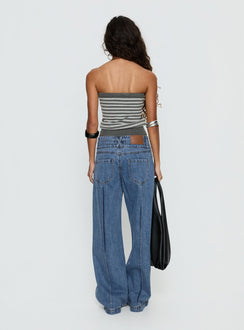 back view of model wearing Princess Polly Hannalee Low Rise Wide Leg Jeans Mid Blue Wash Low Rise Jeans 