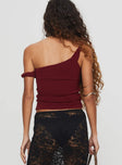 back view of model wearing Princess Polly Messenger One Shoulder Top Burgundy Sleeveless Asymmetric Neckline 