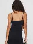 back view of model wearing Princess Polly Nesting Top Black Sleeveless Plunger 