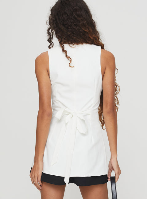 back view of model wearing Princess Polly Mystick Vest Top White Sleeveless Crew Neck 