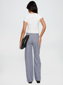 back view of model wearing Princess Polly Top Model Jean Navy Stripe Low Rise Pants 