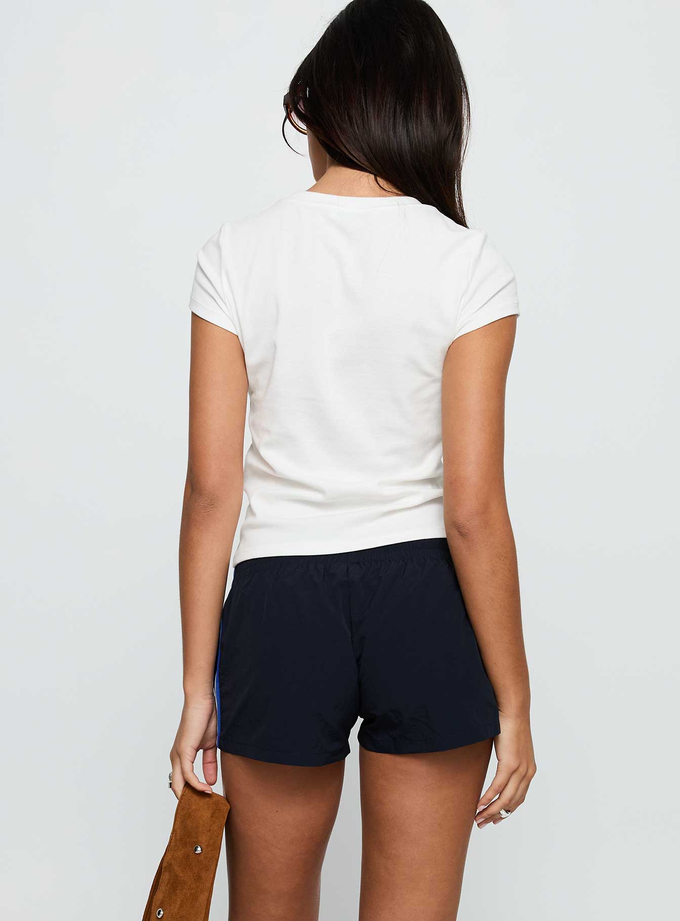 back view of model wearing Princess Polly Twilight Shorts Midnight Low Rise Shorts 