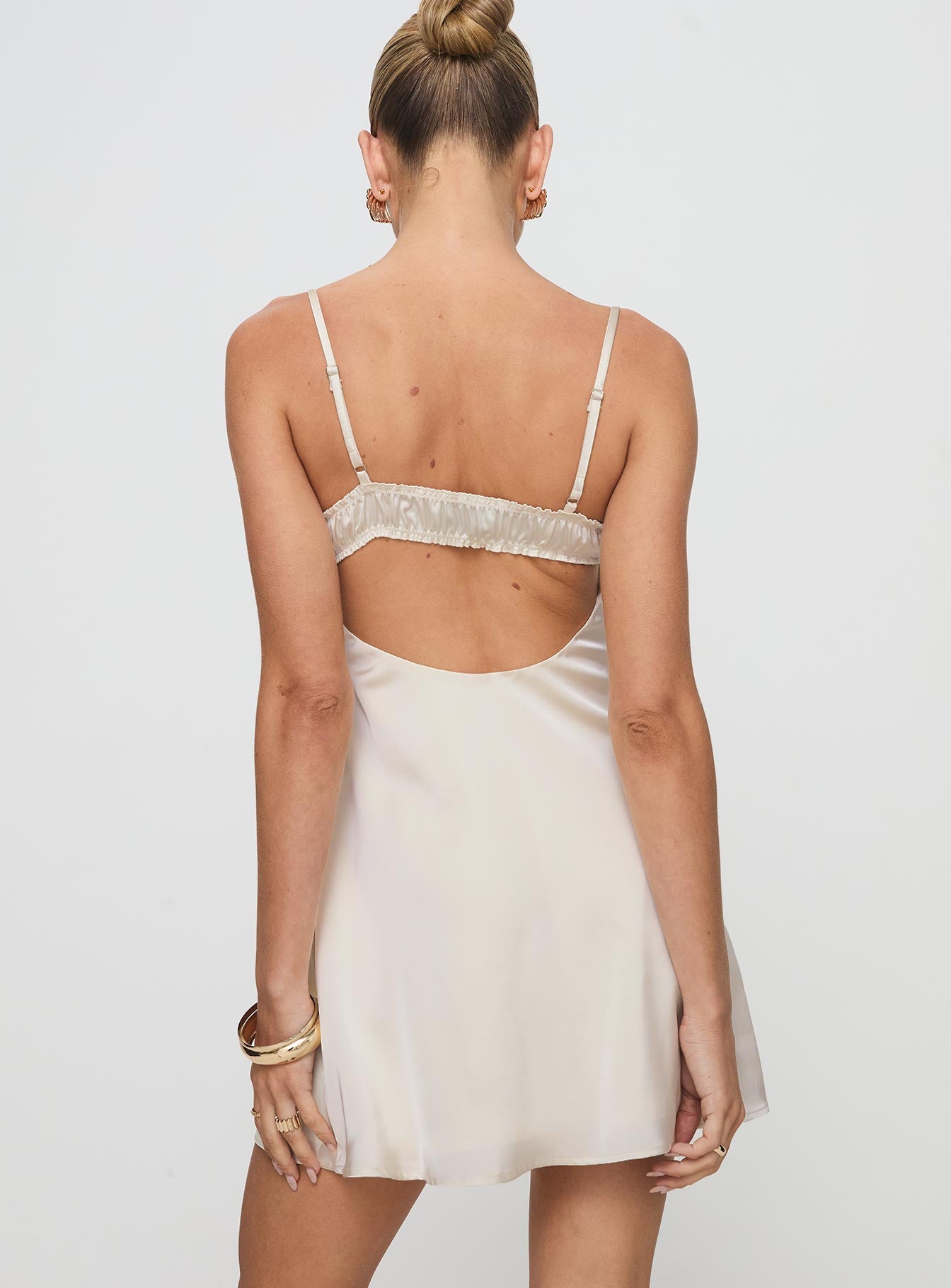 back view of model wearing Princess Polly Decipher Satin Mini Dress Ivory Sweetheart Neckline 