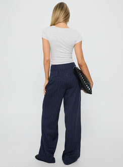 back view of model wearing Princess Polly Lorenne Mid Rise Pant Navy Pinstripe High Waisted Pants 