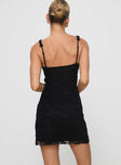 back view of model wearing Princess Polly Wignall Mini Dress Black Square Neck 