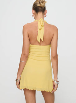 back view of model wearing Princess Polly Leam Mini Dress Butter Petite Plunger 