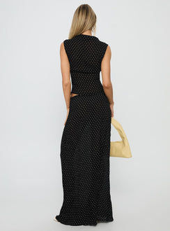 back view of model wearing Princess Polly Ford Maxi Skirt Onyx Polka Maxi 