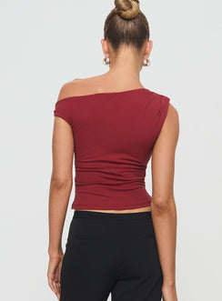 back view of model wearing Princess Polly Danza Top Red Sleeveless Asymmetric Neckline 
