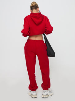 back view of model wearing Princess Polly Dream Fleece Ankle Cuff Sweatpants Red High Waisted Pants 