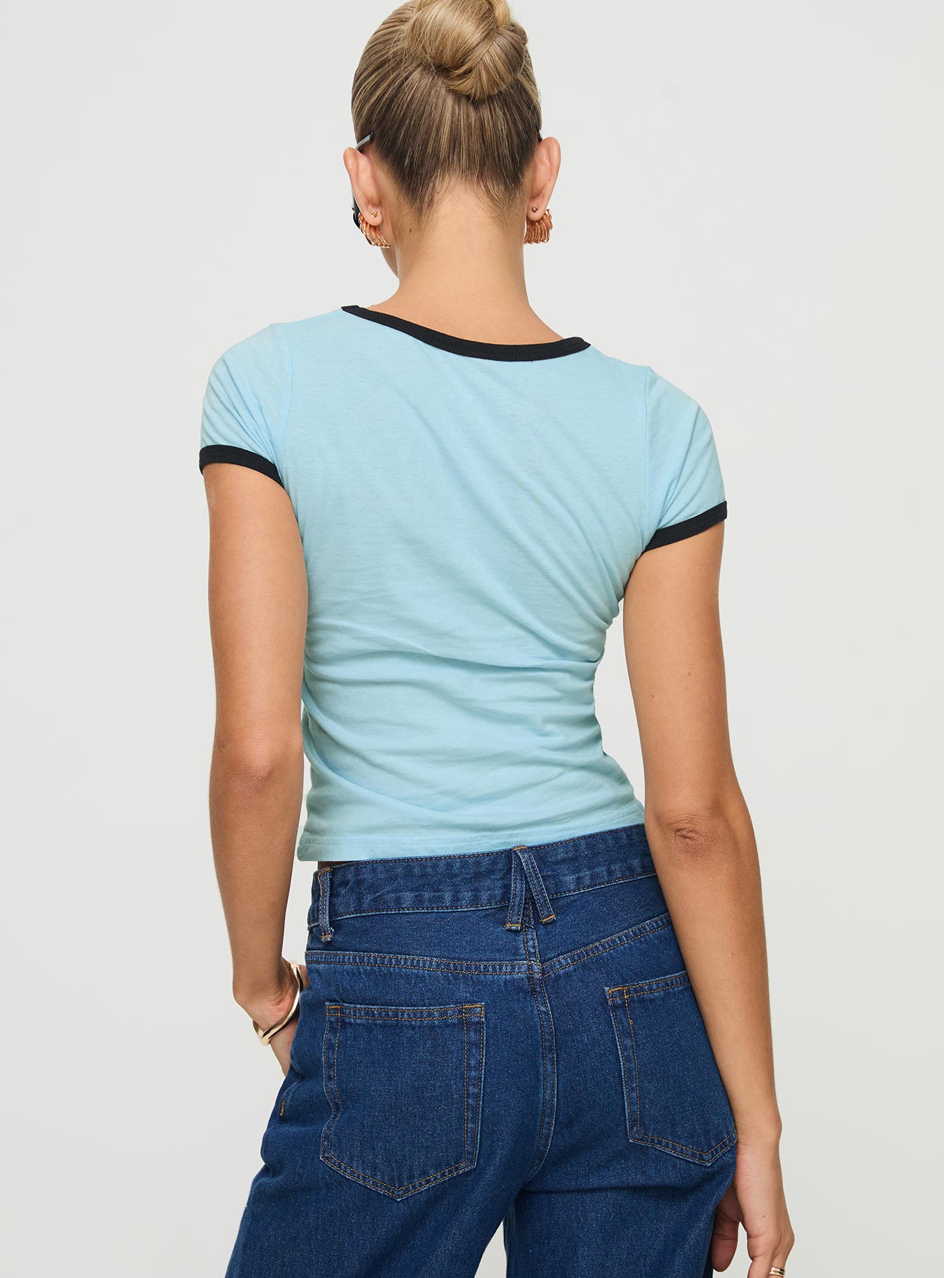 back view of model wearing Princess Polly Delorean Tee Blue Short Sleeves Crew Neck 