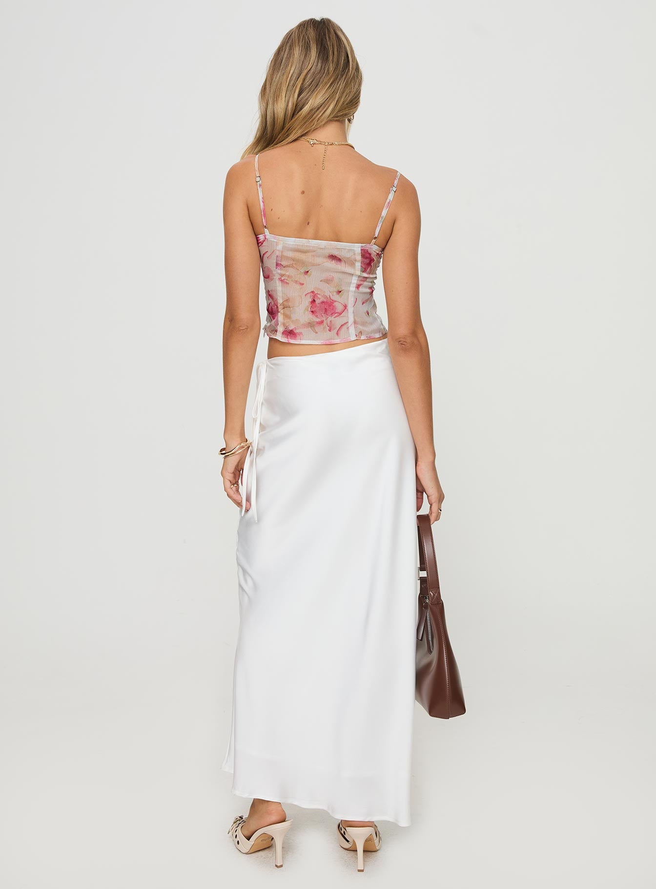 back view of model wearing Princess Polly Fluttering Maxi Skirt White Maxi 