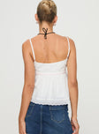 Linen top V neckline, adjustable straps, lace trim, floral detail Non-stretch material, lined bust
