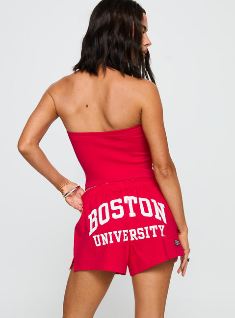 back view of model wearing Princess Polly Boston University Soffee Shorts Red High Waisted Shorts 
